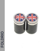 Two FOLDRIO Brompton Union Jack Valve Caps – Schrader (A/C/G Line), small and cylindrical with lids, are side by side on a white background. The word FOLDRIO is displayed vertically on the left edge.