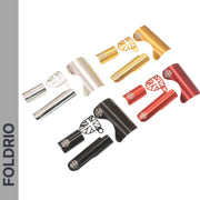 A set of FOLDRIO Brompton Frame Protector Set with British Flag parts—clamps, tubes, and protector—in silver, gold, red, and black arranged on white. "FOLDRIO" appears vertically on a gray strip to the left.