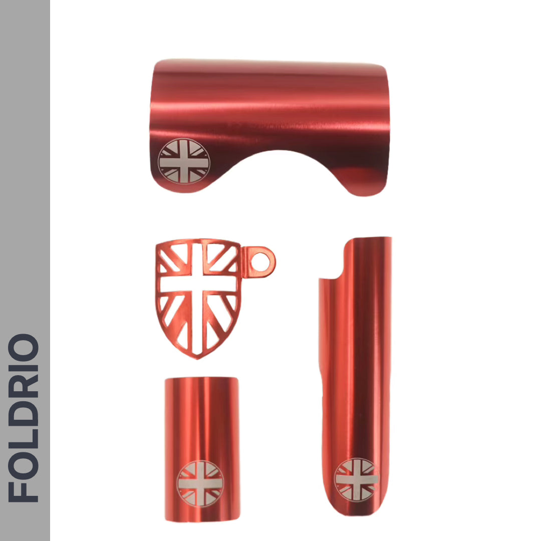 Four metallic red Brompton Frame Protector Set pieces with British flag cutouts, including a rear fork cover and chainstay guard, are displayed vertically. FOLDRIO branding appears on the grey side panel—perfect for protecting your Brompton bike.