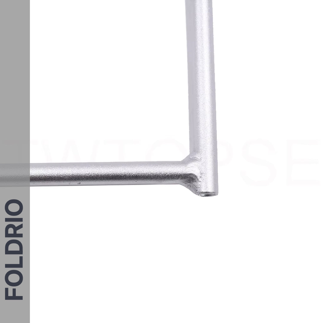 Close-up of the Brompton Rear Rack – Lightweight Aluminium Cargo Rack, a metallic L-shaped frame on a white background. It has a vertical gray bar on the left with FOLDRIO in bold letters; ideal for easywheel mounts.