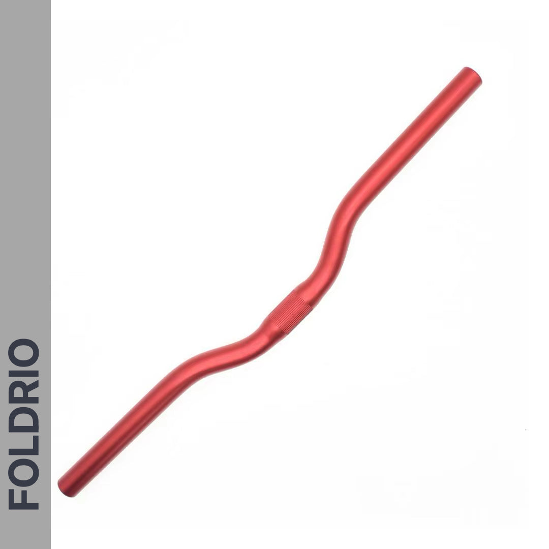 Brompton M Handlebar – Anodised Aluminium, available in 5 colours. Features a slight rise and curve for an upright riding position. Displayed on white with a vertical grey bar left showing FOLDRIO in bold black.