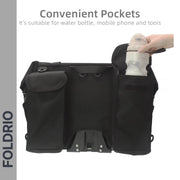 The FOLDRIO Brompton Roll-Top Front Bag (27.5L) is shown in black with multiple pockets. A water bottle is placed in a side pocket. Text reads: Convenient pockets for water bottles, mobiles & tools. FOLDRIO branding on the left.