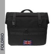 The FOLDRIO Brompton Roll-Top Front Bag (27.5L) is a black commuter and laptop bag, featuring a Union Jack front patch, dual top buckle closures, and “FOLDRIO” on a grey side strip. Compatible with the Brompton front carrier block.