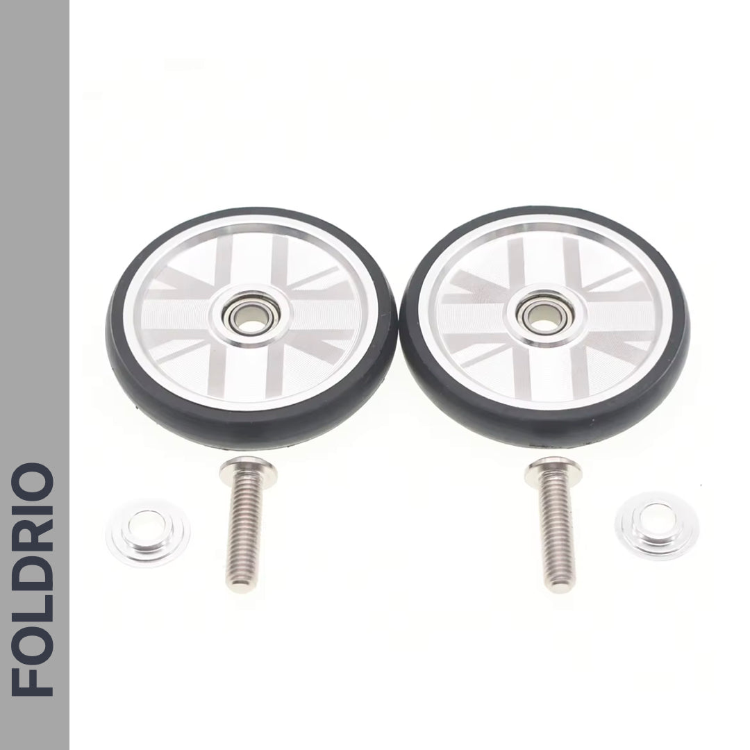 Two FOLDRIO Brompton Easy Wheels Union Jack Edition with laser-engraved hubs, titanium bolts, and rubber tires, displayed on a white background.
