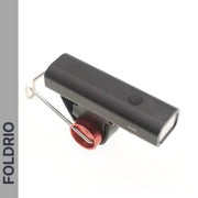 The FOLDRIO Brompton Front Fork Light—400 Lumen, USB-C Rechargeable—is shown in black with a red mounting ring and wire bracket on a white background. "FOLDRIO" appears vertically on the left. Features an adjustable 400 lumen beam.