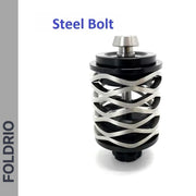 The FOLDRIO Brompton Rear Shock Absorber features a steel bolt with a spiral wire design and black circular parts, perfect as suspension material for Brompton Folding Bikes. "Steel Bolt" appears above, with "FOLDRIO" vertically on the left side.
