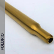 A metallic multicolour cylindrical tube with a slight taper and open end lies on a white surface. "FOLDRIO," the brand behind the Brompton Titanium Seatpost – Multicolour Edition, appears vertically on a gray sidebar to the left.