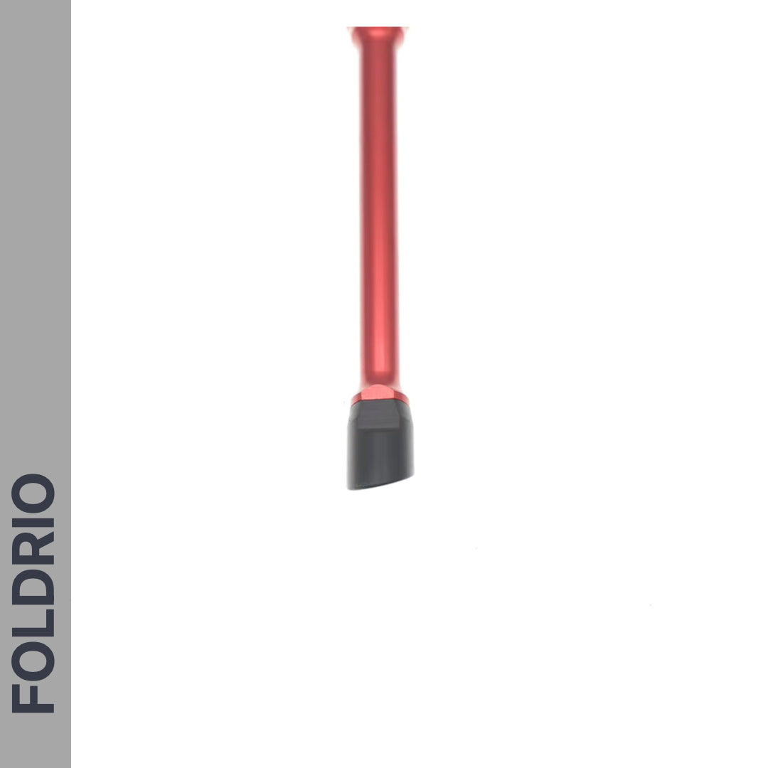 A red Brompton Kickstand – Adjustable Aluminium (A and C Line) by FOLDRIO stands upright with a black angled tip on a white background. On the left, a grey vertical bar displays FOLDRIO in bold, dark letters.