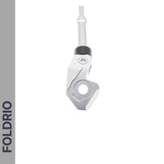 Close-up of the FOLDRIO Brompton Kickstand – Adjustable Aluminium for A and C Line, showing the rear axle mount against a white background with "FOLDRIO" in bold on a gray strip to the left.