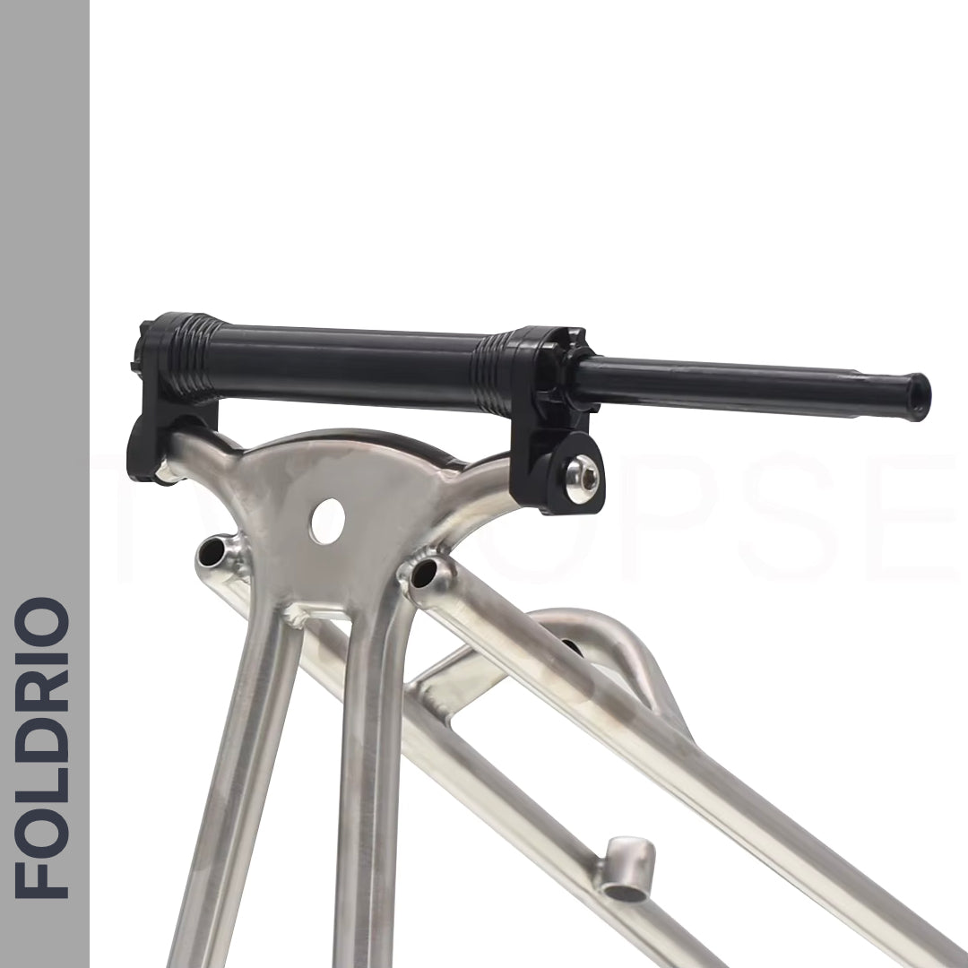 Brompton Brompton foldable bike frame with FOLDRIO branding, showing Easy Wheel & Extension Rod Set for smooth transport | Foldrio. Foldrio