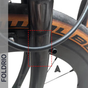 Brompton Brompton front fork and wheel with tan sidewall tire; red dashed box marks ideal spot for Foldrio protective sticker set | Foldrio. Foldrio
