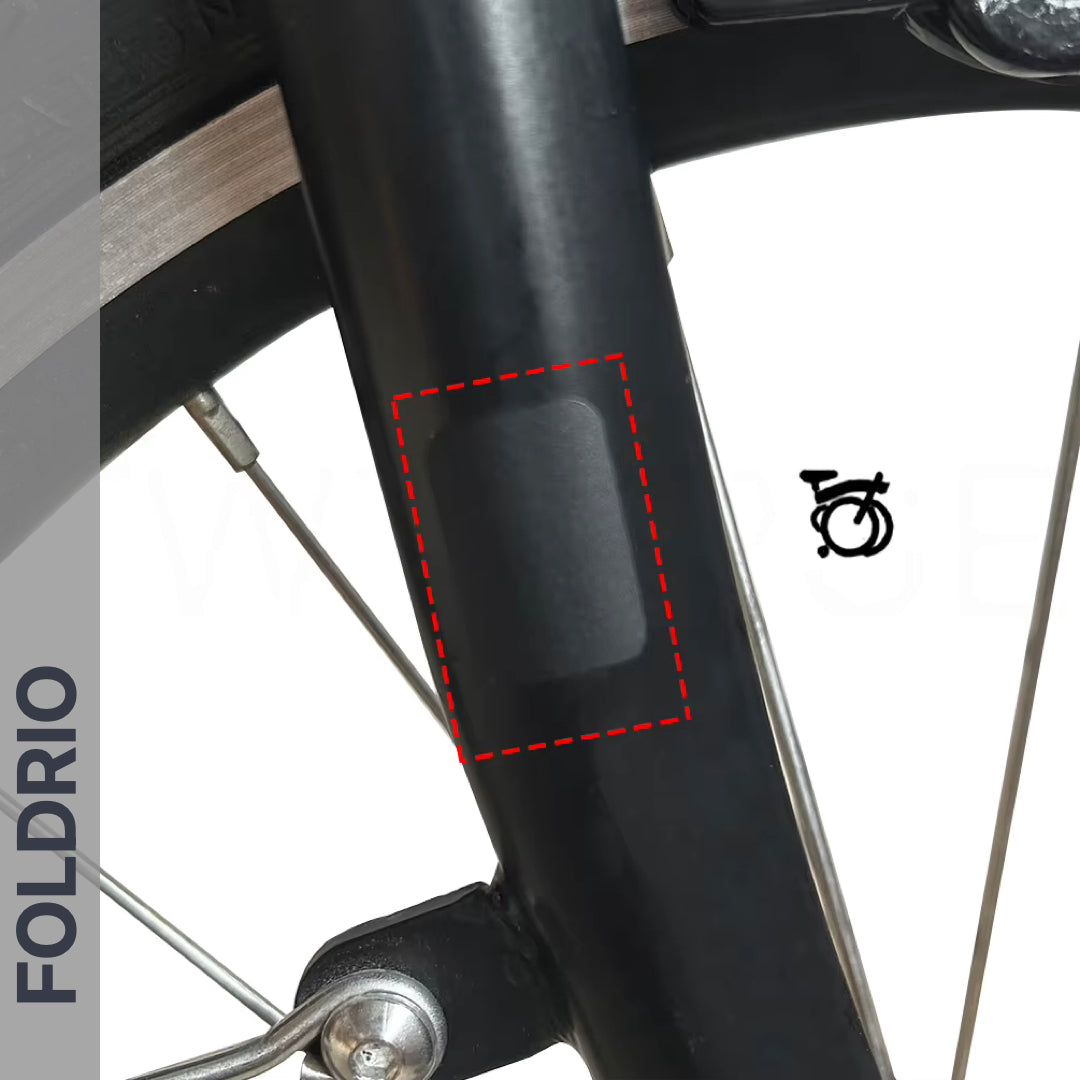Brompton Brompton black fork with FOLDRIO protective sticker, red dashed border, partial wheel and brake, "FOLDRIO" on side | Foldrio. Foldrio